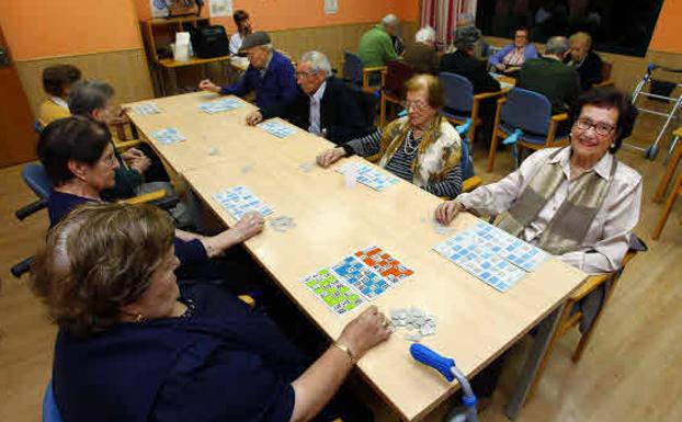 A group of pensioners playing bingo. 